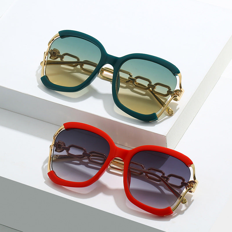 Chain-Detail Oval Sunglasses - Veloura