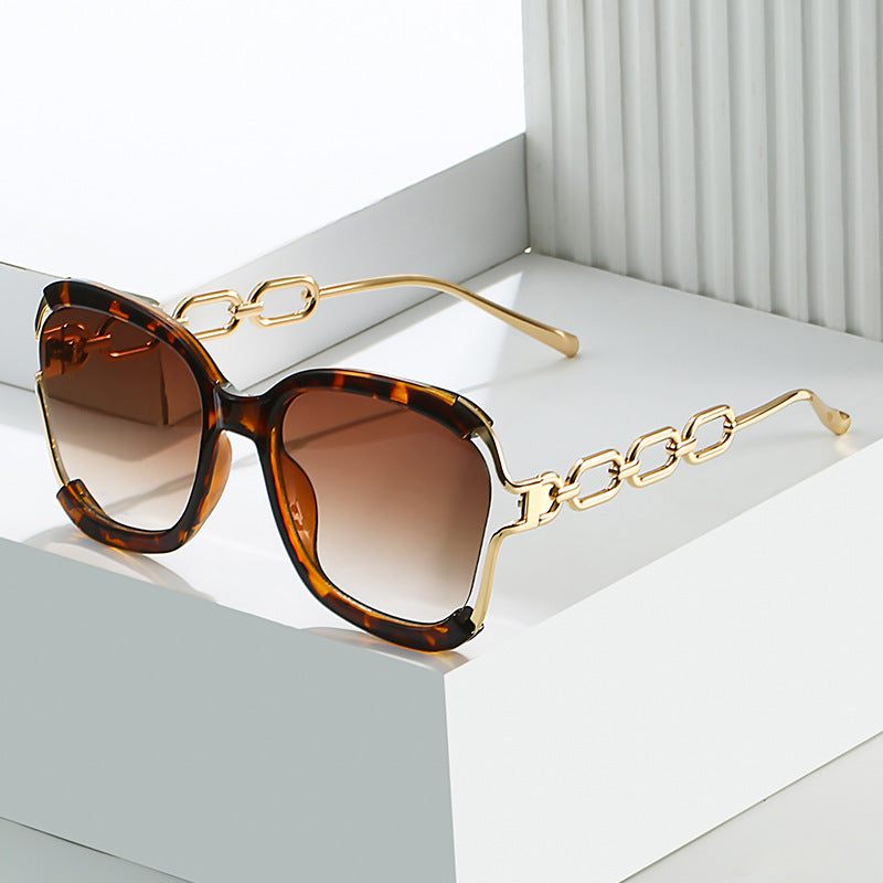 Chain-Detail Oval Sunglasses - Veloura